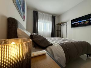 A bed or beds in a room at BaySide1 Marsaxlokk Malta