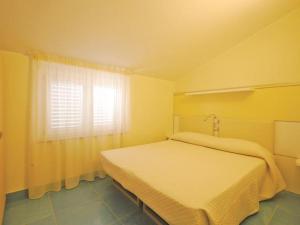 Postel nebo postele na pokoji v ubytování Residence Abruzzo Resort
