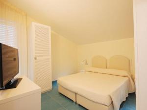 Postel nebo postele na pokoji v ubytování Residence Abruzzo Resort