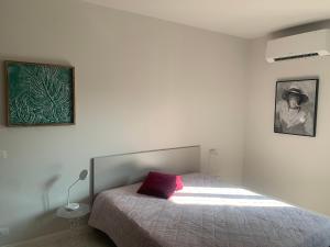 Кровать или кровати в номере 123 Guest House