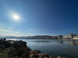 a body of water with the sun in the sky at Cielo B&B in Crotone