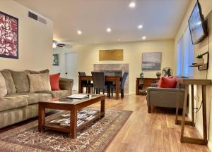 a living room with a couch and a table at Zen Desert, 2BR/2BA Apartment, Private Entrance in Sedona