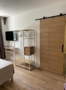 Postel nebo postele na pokoji v ubytování La grange du Contourés