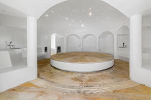 Ένα μπάνιο στο Entremonte Wellness Hotel and Spa