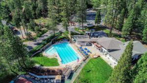 an overhead view of a swimming pool in a backyard at Dragonfly Lodge in Arnold