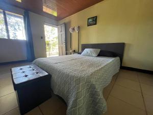 Voodi või voodid majutusasutuse Hotel Azul Coral toas