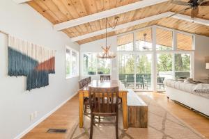 a dining room with a table and a couch at Kelly Cabin in Arnold