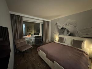 Posteľ alebo postele v izbe v ubytovaní Health and Spa by Doro im Hotel am Schwanenweiher