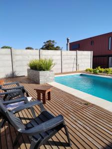 Πισίνα στο ή κοντά στο Duplex familiar con pileta en zona parque