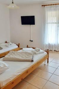 Postel nebo postele na pokoji v ubytování Allotino Hotel - Café & snacks