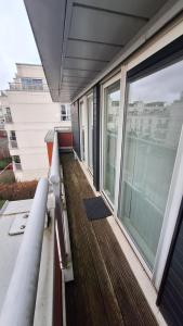 a balcony of a building with a large window at Free parking near city centre & stadium sleeps 6-8 in Leicester