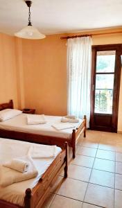 Postel nebo postele na pokoji v ubytování Allotino Hotel - Café & snacks
