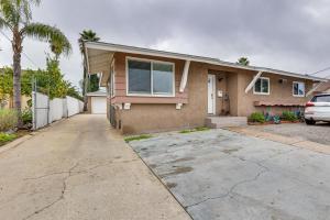 a house with a car parked in front of it at Escondido Vacation Rental about 1 Mi to Grape Day Park in Escondido