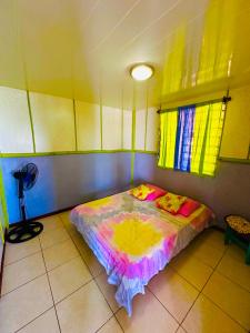 Кровать или кровати в номере Teraupoo Lodge Chalet
