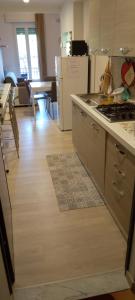 a kitchen with a stove and a counter top at OASI FELICE in Levanto