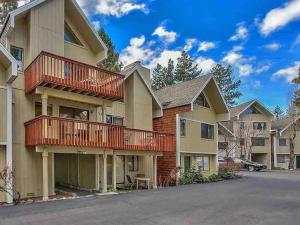 a large apartment building with a balcony at Cozy & affordable, Spacious Condo by the lake in Incline Village