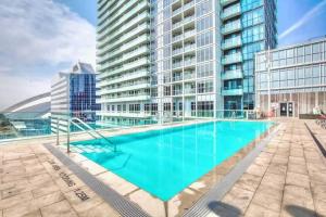 a large swimming pool in the middle of a building at CN lovers in Toronto