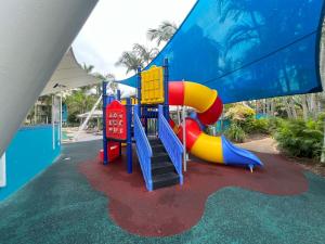 a playground at a resort with a slide at CHA Private Apts Diamond Beach in Gold Coast