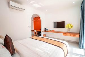 TRUONG PHU HOUSE - HOTEL & APARTMENT 객실 침대