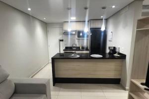 Køkken eller tekøkken på Studio 100% mobiliado e decorado 26