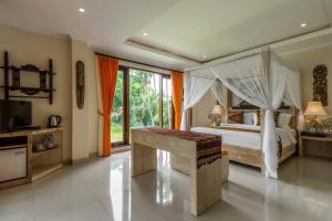 Letto o letti in una camera di Gefecon Villa Ubud