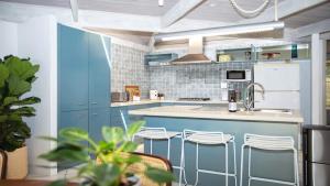 Кухня или мини-кухня в Blue Pearl - Pet Friendly
