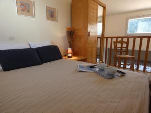 Posteľ alebo postele v izbe v ubytovaní Maison avec Terrasse Proche Plage - Notre-Dame-de-Monts, 4 Pers. - FR-1-540-225