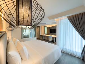 TV a/nebo společenská místnost v ubytování Amethyst Hotel Pattaya