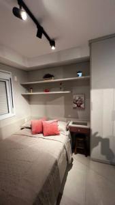 Postel nebo postele na pokoji v ubytování Studio Cidade Maia equipado 13 + 21 fotografií