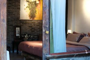 Postel nebo postele na pokoji v ubytování Full Moon Inn