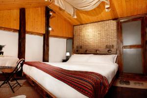 Postel nebo postele na pokoji v ubytování Full Moon Inn