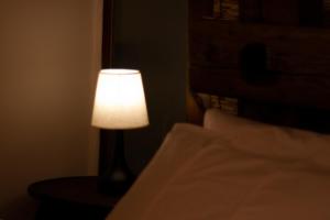 Postel nebo postele na pokoji v ubytování Full Moon Inn