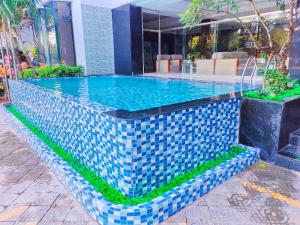 Bazén v ubytování Kieu Anh Hotel Vung Tau nebo v jeho okolí