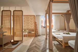 Voodi või voodid majutusasutuse The Ann Hanoi Hotel & Spa toas