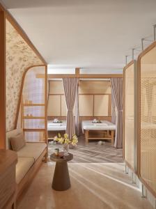 Voodi või voodid majutusasutuse The Ann Hanoi Hotel & Spa toas
