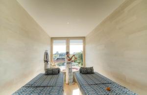 Posezení v ubytování Astera Luxury Resort & Spa Canggu by Ini Vie Hospitality