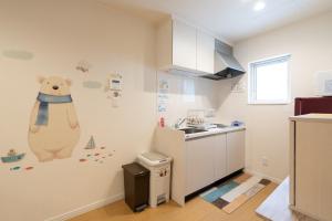 The Peak Villa Suite Hokkaido tesisinde mutfak veya mini mutfak