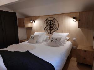 Posteľ alebo postele v izbe v ubytovaní Le Chalet des O