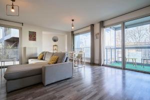 Khu vực ghế ngồi tại Appartement proche métro & 2 balcons + parking