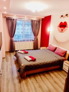 Ένα ή περισσότερα κρεβάτια σε δωμάτιο στο Luxury Apartments Melnyka 10