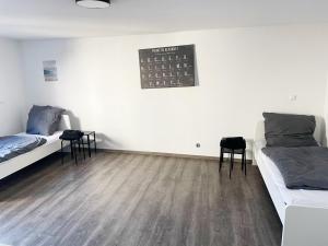 Postel nebo postele na pokoji v ubytování Cozy Apartment in Bad Vilbel
