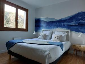 Posteľ alebo postele v izbe v ubytovaní Le Chalet des O