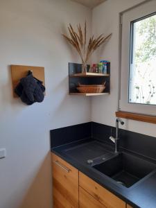 Kuchyň nebo kuchyňský kout v ubytování Ferienhaus Bug + 20 fotografií