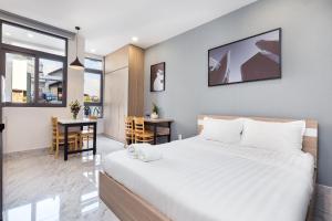 Giường trong phòng chung tại YOURS Apartment - Airport