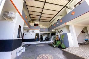 Fotografie z fotogalerie ubytování Kana Guest House Mitra RedDoorz v destinaci Uluwatu