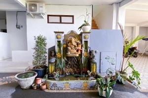 Fotografie z fotogalerie ubytování Kana Guest House Mitra RedDoorz v destinaci Uluwatu
