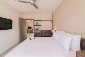 Letto o letti in una camera di Canary Dalat Hotel