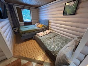 an overhead view of a room with two beds at Vantaa Sauna Cottage in Vantaa