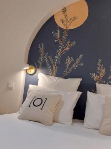 Posteľ alebo postele v izbe v ubytovaní Le Chalet des O