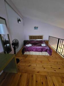 Letto o letti in una camera di IVERIA BEACH